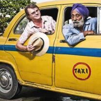 Paul_merton_in_india_241x208